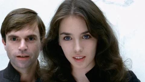 "Possession" (1981), directed by Andrzej Żuławski, stars Isabelle Adjani and Sam Neill in a haunting psychological horror masterpiece.